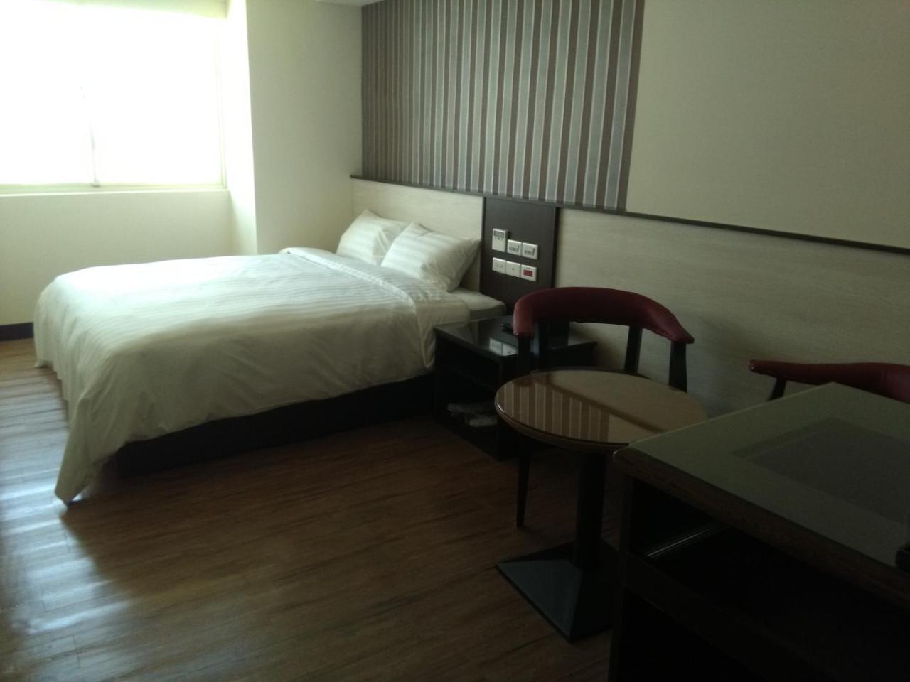 Dengfeng Milan Business Hotel Huwei Extérieur photo