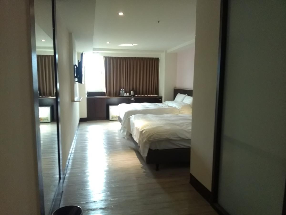 Dengfeng Milan Business Hotel Huwei Extérieur photo